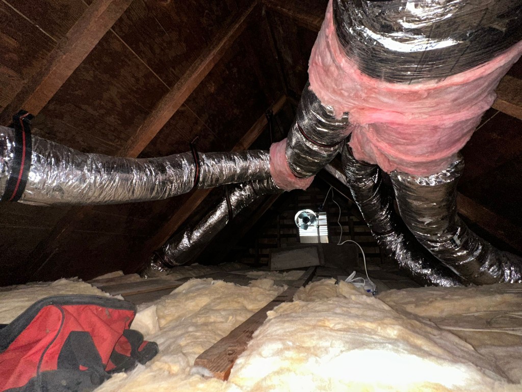 Los Angeles attic before Pure Eco cleaning — contaminated insulation and debris