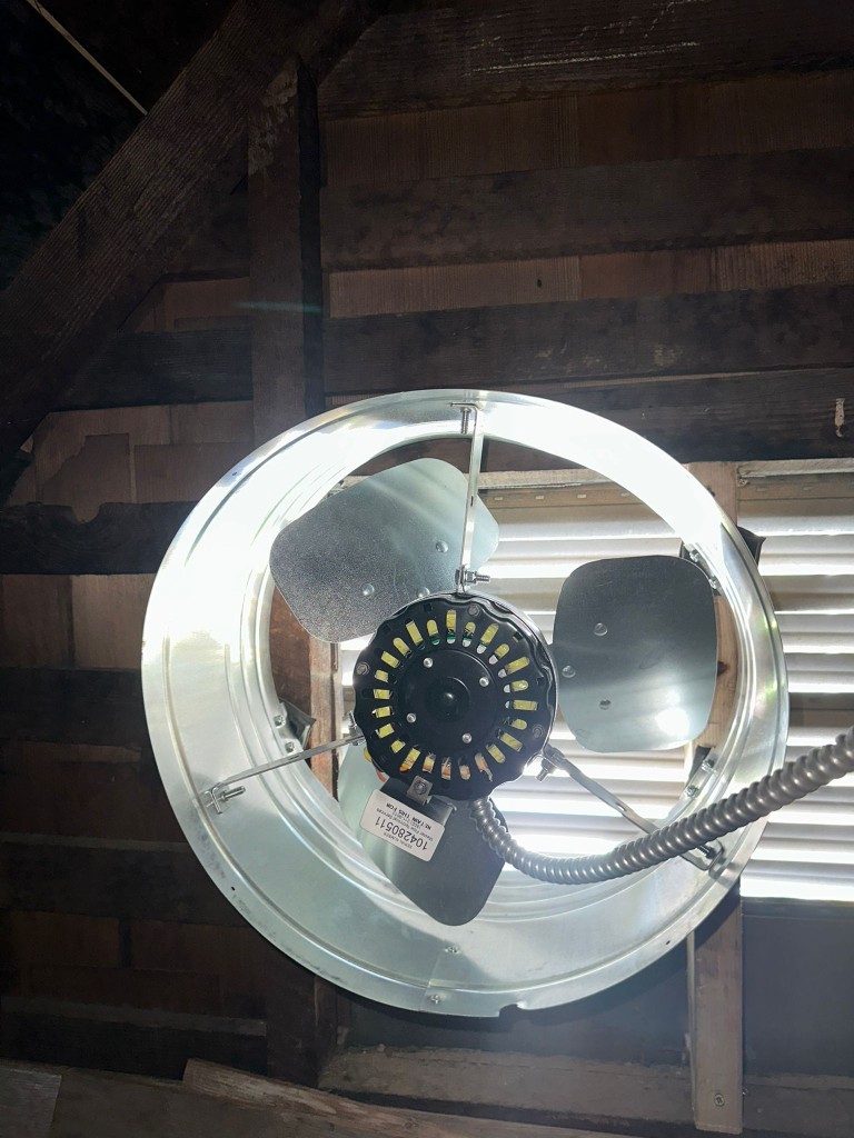 Completed attic fan install with controller wired and mounted