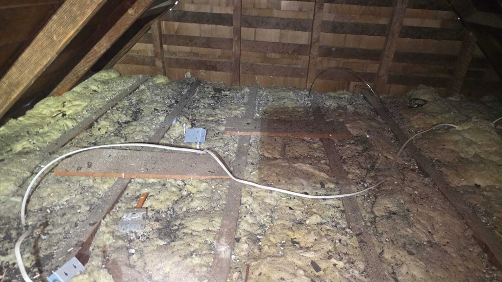 Los Angeles attic before Pure Eco cleaning — contaminated insulation and debris