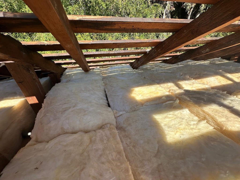 Attic decked and sanitized by Pure Eco after full cleanout