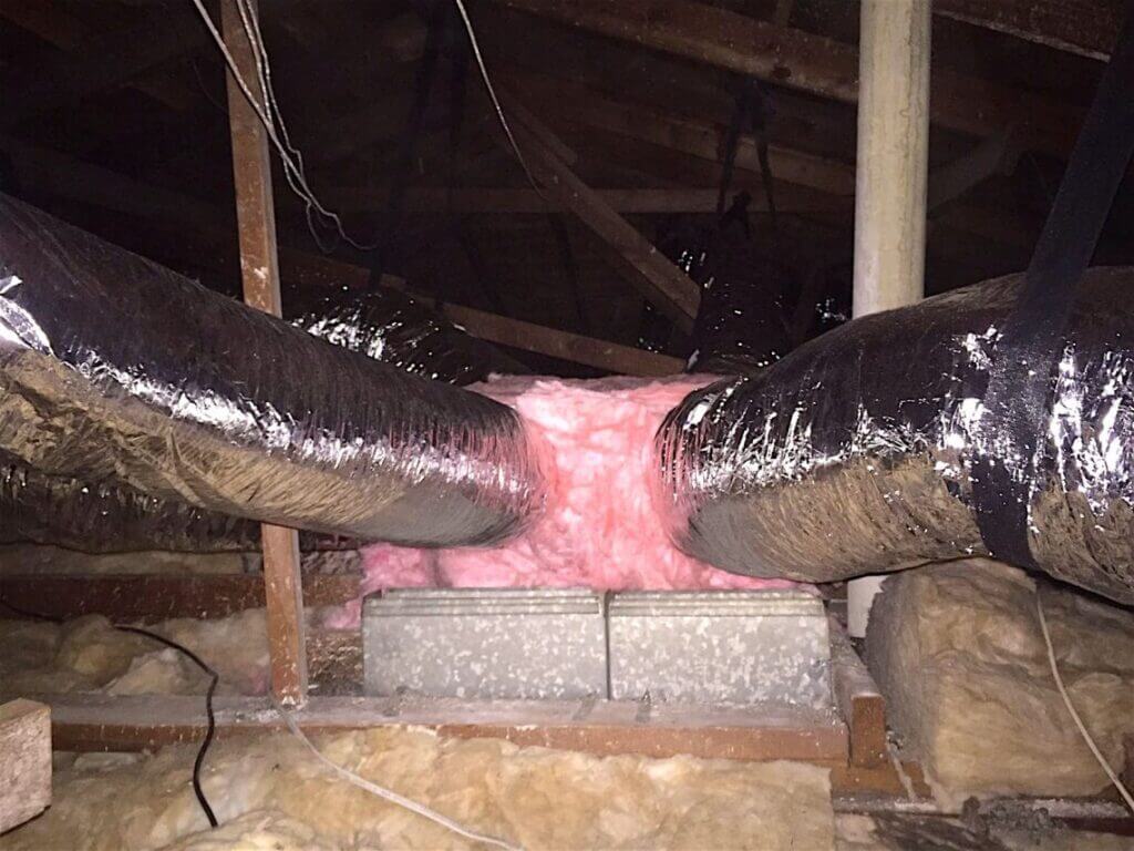 New insulated flex duct runs installed and supported in the attic