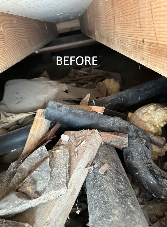 Crawlspace with fallen insulation and debris before Pure Eco cleanout