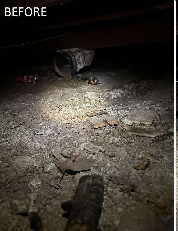 Crawlspace with fallen insulation and debris before Pure Eco cleanout