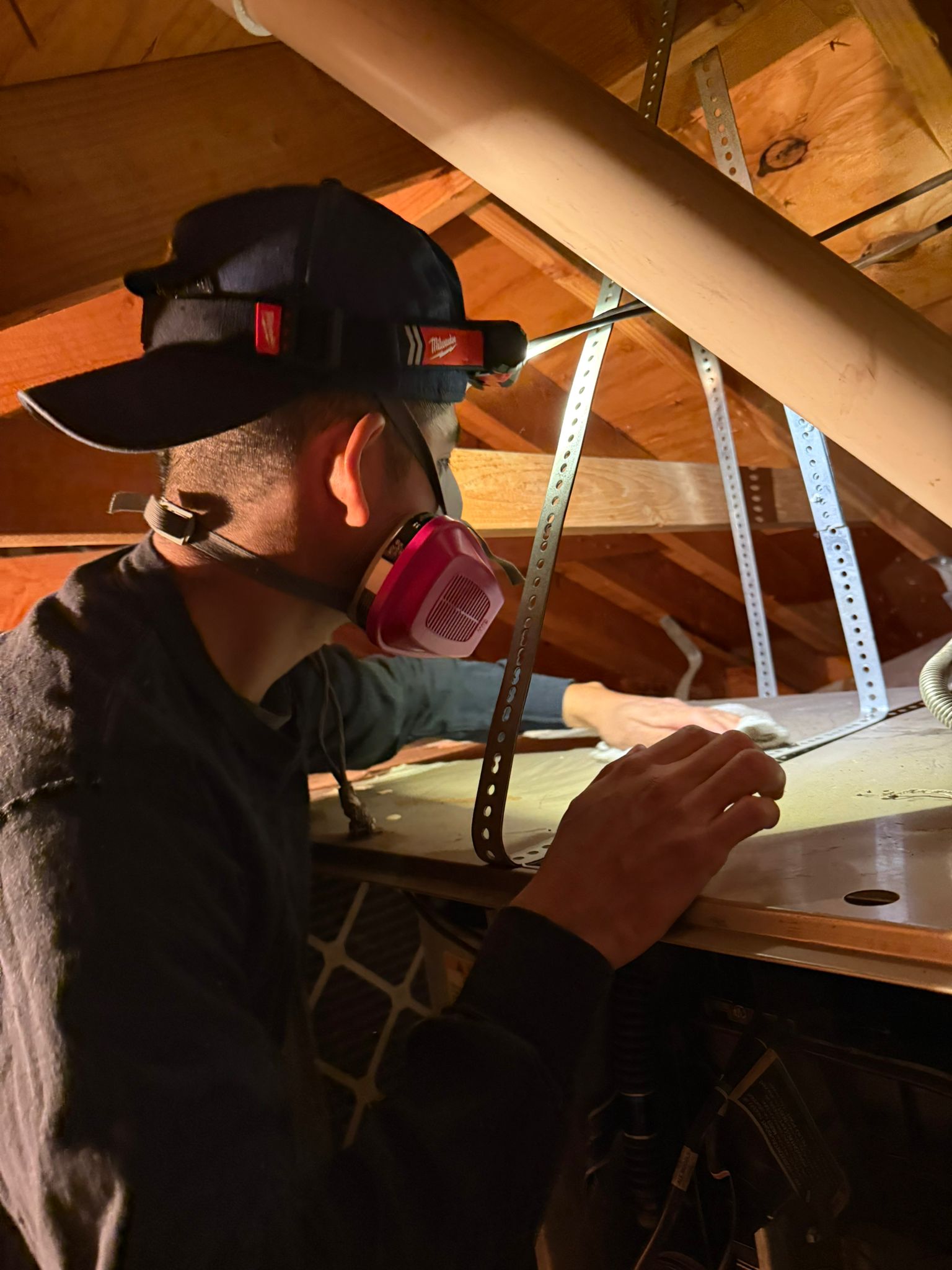 Pure Eco technician servicing HVAC equipment during a system swap