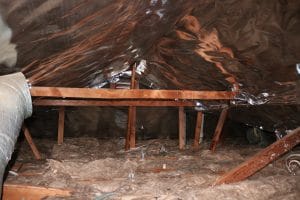 Radiant barrier fully installed across the attic roofline