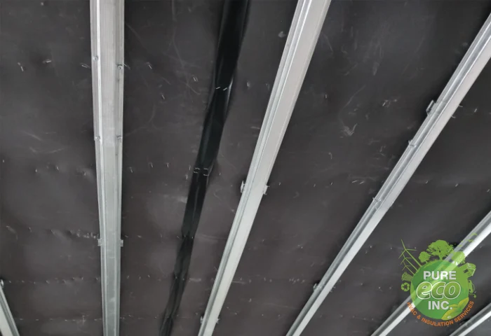 Mass-loaded vinyl and resilient channel soundproofing installed