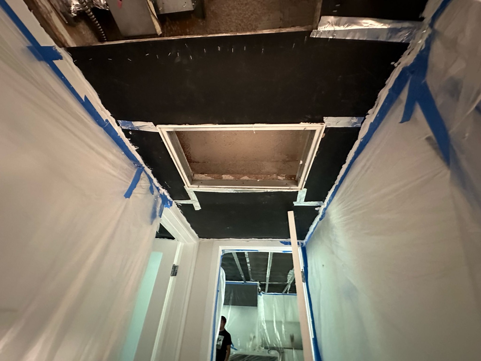 Mass-loaded vinyl and resilient channel soundproofing installed